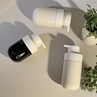 Gordura de forma redonda PET garrafa cosmética com bomba de pressão e impressão de tela de seda de cor personalizada para embalagens de beleza