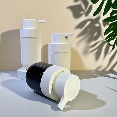 Gordura de forma redonda PET garrafa cosmética com bomba de pressão e impressão de tela de seda de cor personalizada para embalagens de beleza